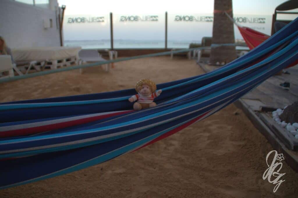 Charlie sitting in one of the hammocks at the Billabong Surfcamp
