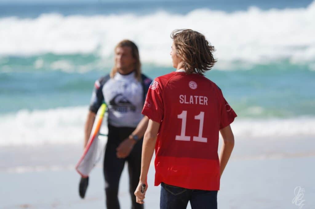 Boy wearing a Slater shirt with Ricardo Christie
