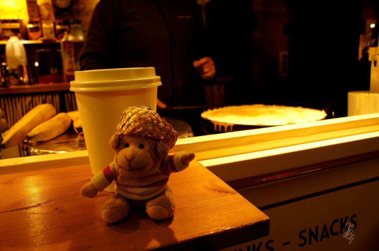 Charlie enjoying a mulled wine and a crepe at Blenheim Palace
