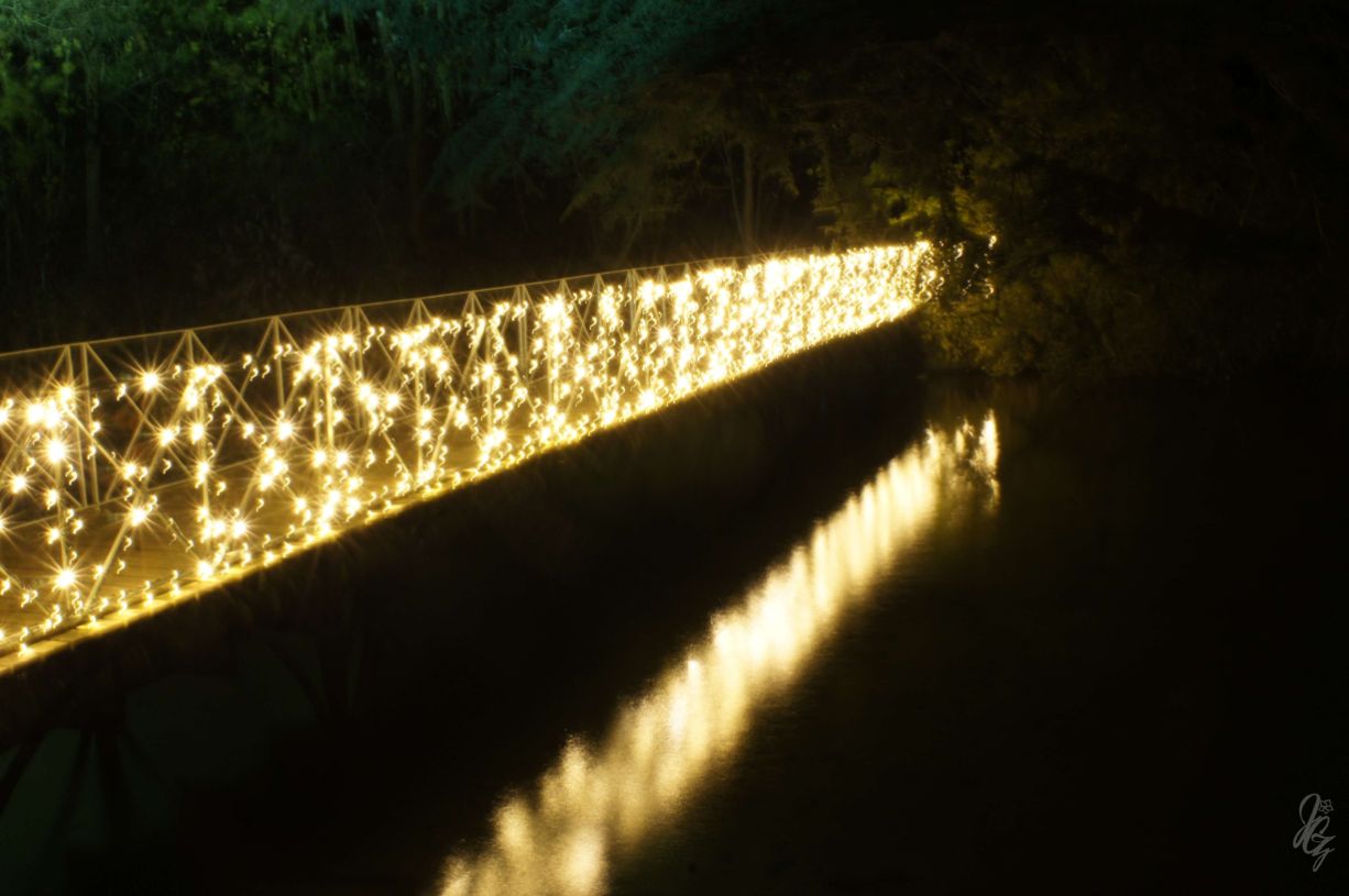 Lights over the river Glyme at Blenheim Palace