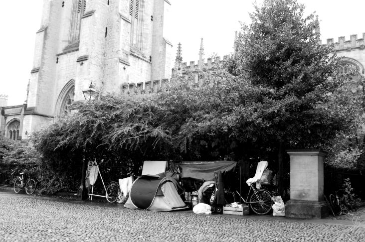 Homeless people in front of the University Church in Oxford