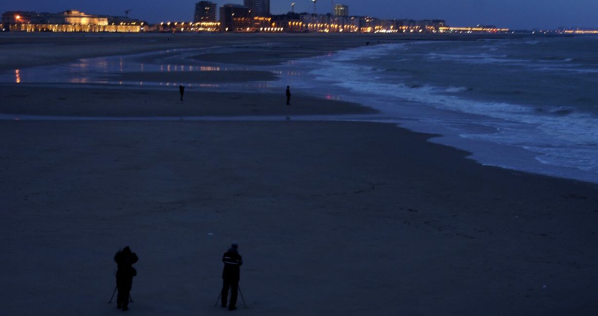 View along the beach in Ostend at blue hour