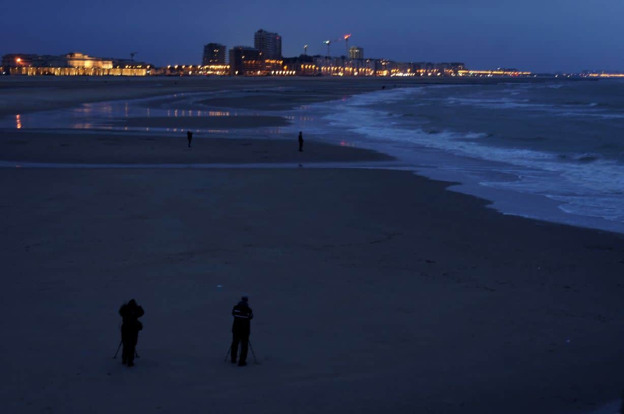View along the beach in Ostend at blue hour