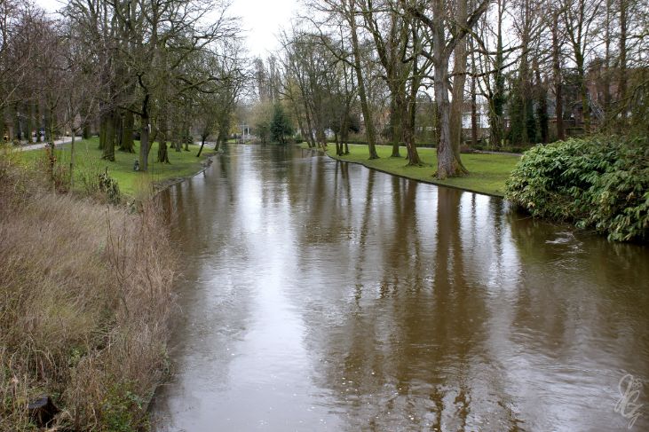 River and green space in Bruges.