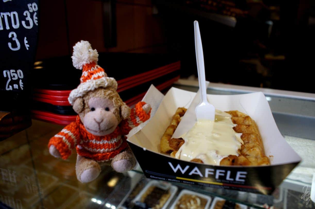 Charlie enjoying a waffle in Brussels