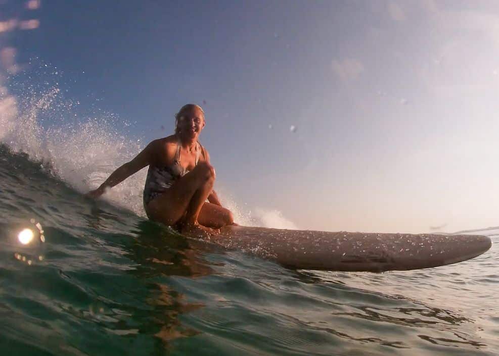 Natalie Fox surfing