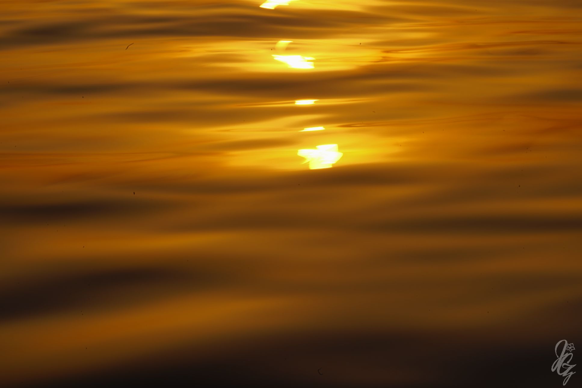 Sunset reflections on the sea