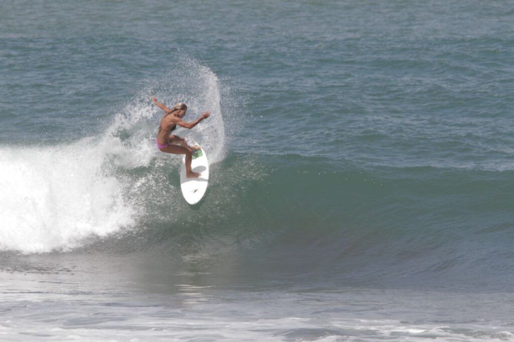 Surfer at Playa Hermosa in Costa Rica
