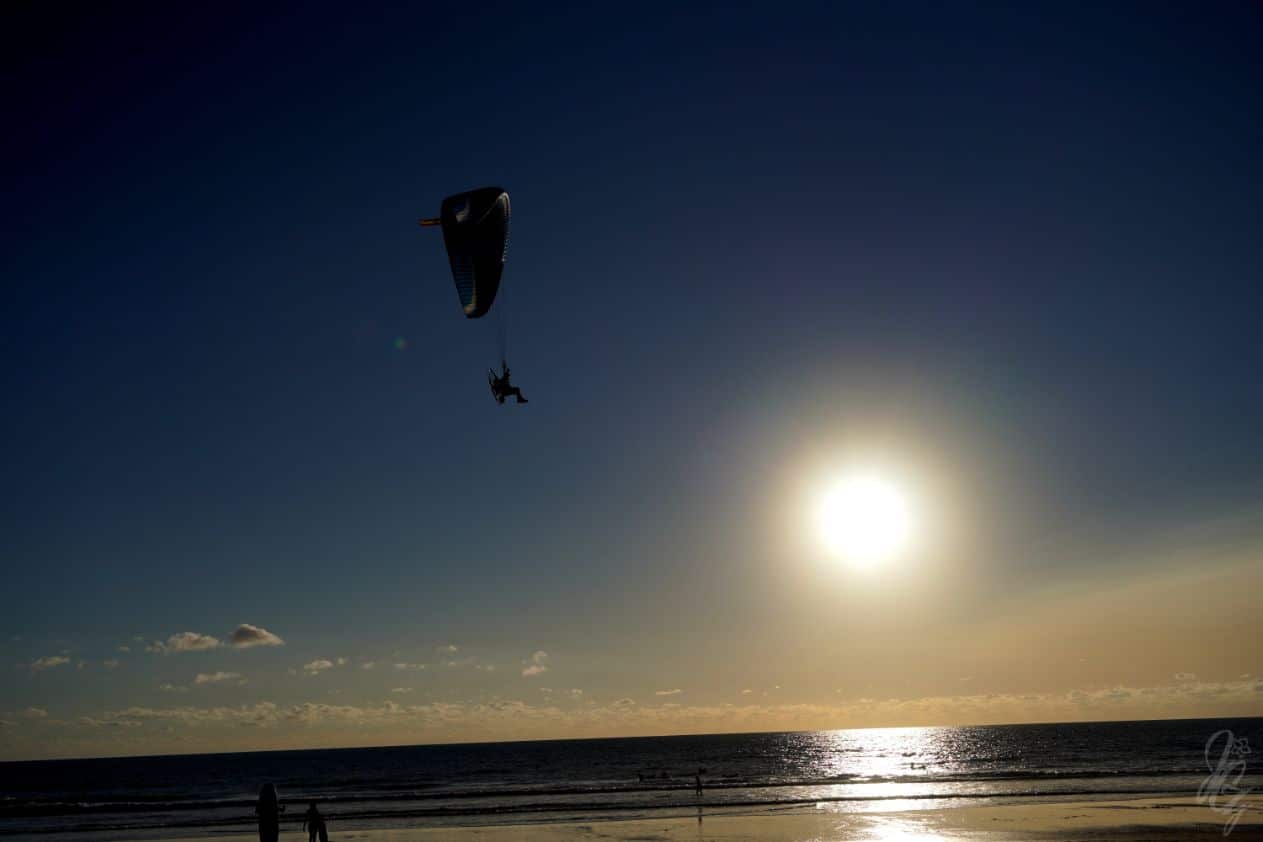 Paragliders in El Palmar just before sunset