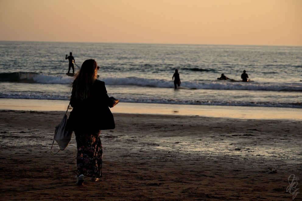 Woman at the beach in El Palmar at sunset