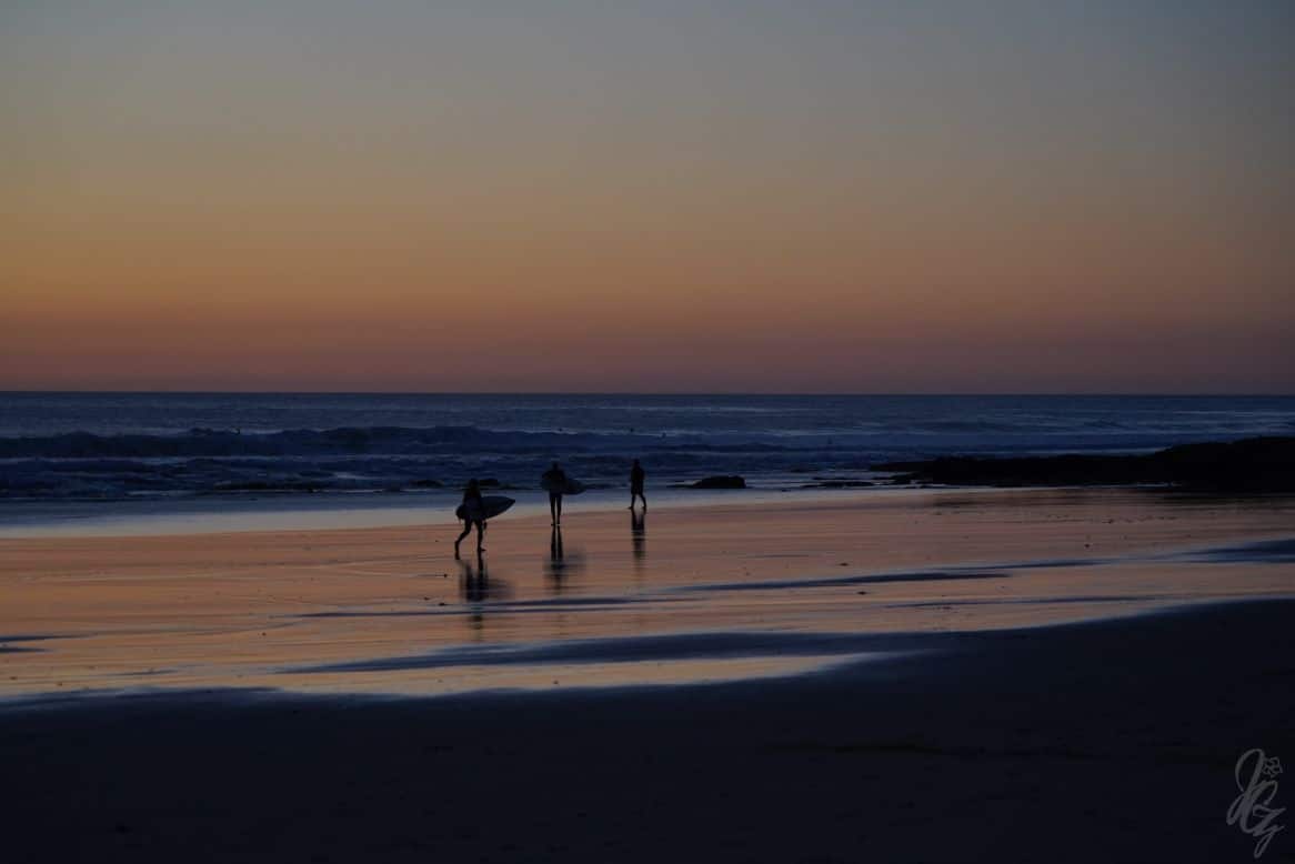 Surfing at sunset in El Palmar