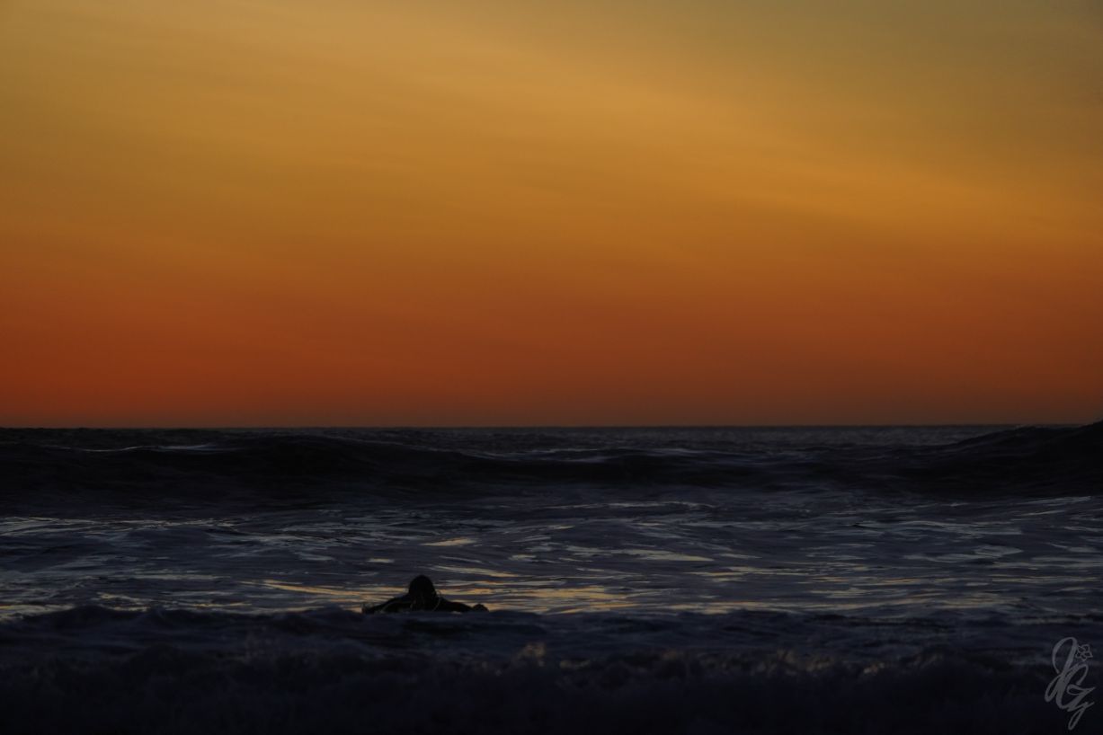 Paddling out at sunset in El Palmar