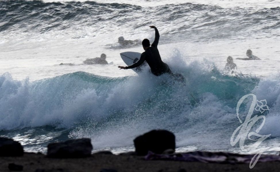 Surfer in Playa de las Americas in Tenerife