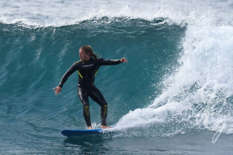 Surfer in Playa de las Americas in Tenerife