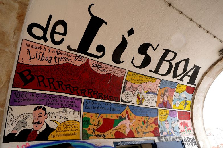 Graffiti with the history of Lisbon at the entrance to Alfama