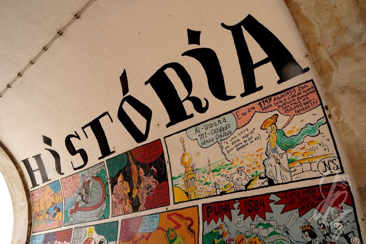 Graffiti with the history of Lisbon at the entrance to Alfama