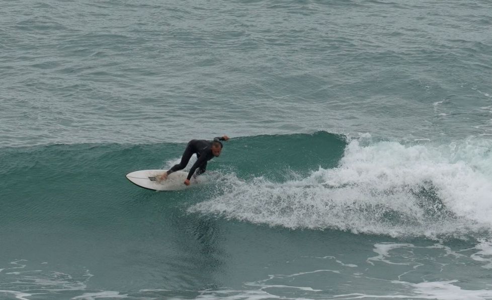Surfer at Watergate Bay