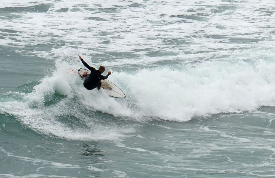 Surfer at Watergate Bay