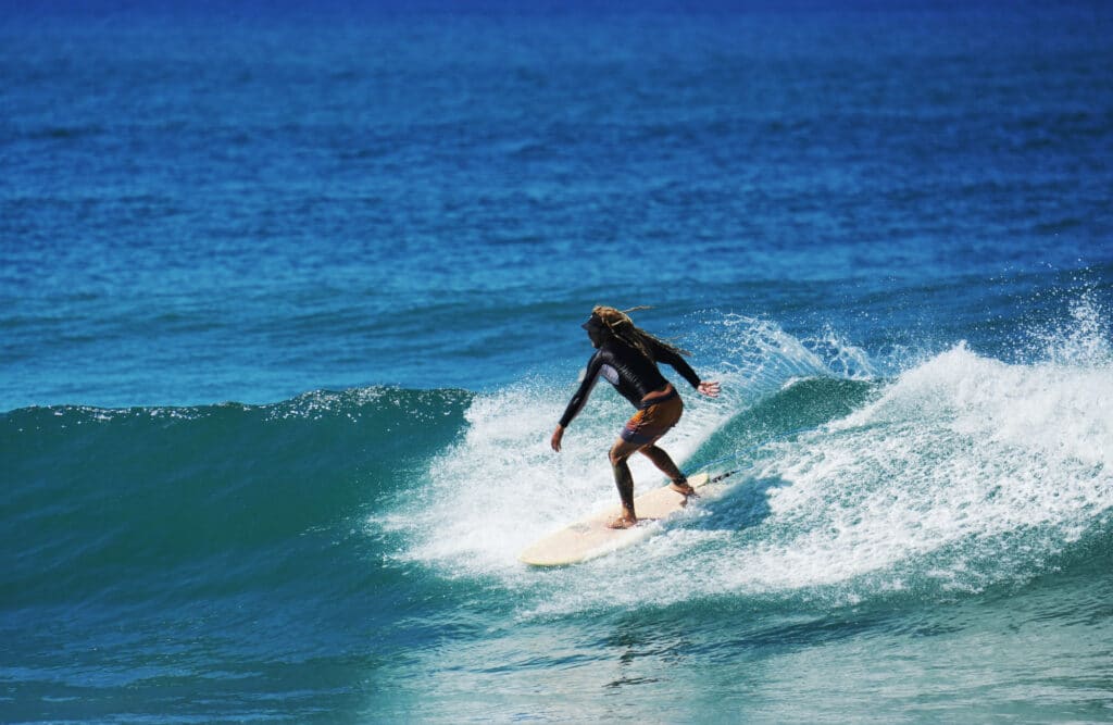 Surfing at Playa Carmen near Santa Teresa
