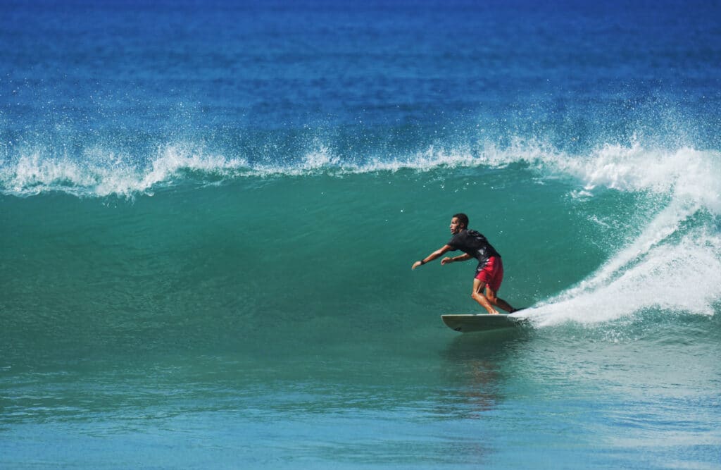 Surfing at Playa Carmen near Santa Teresa