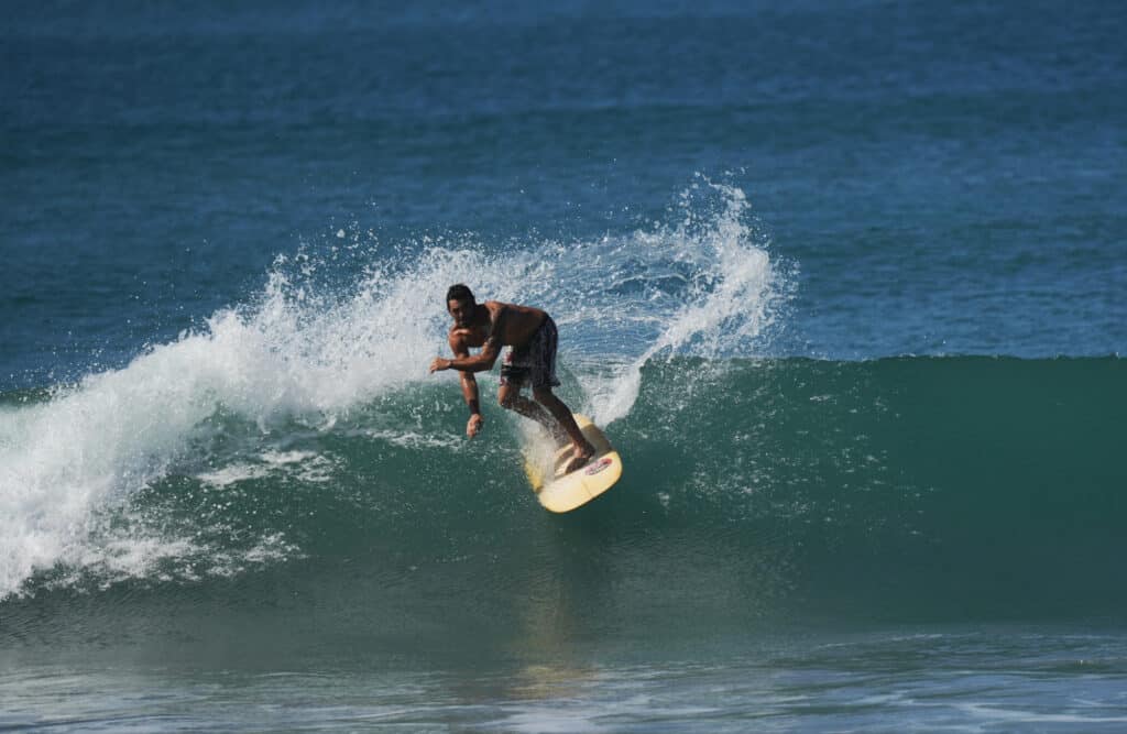 Surfing at Playa Carmen near Santa Teresa