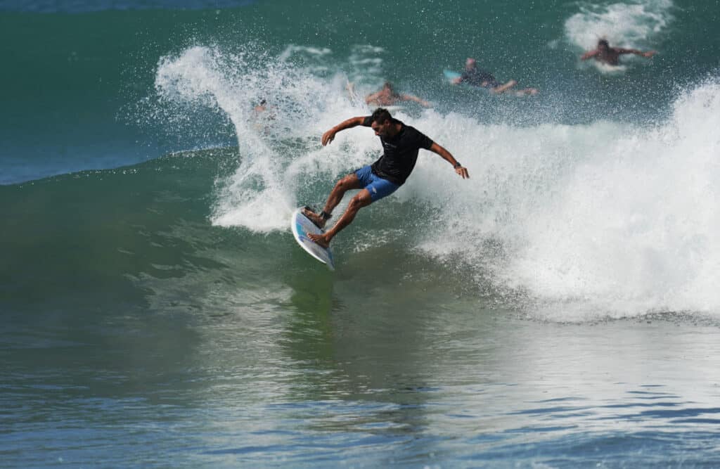 Surfing at Playa Carmen near Santa Teresa