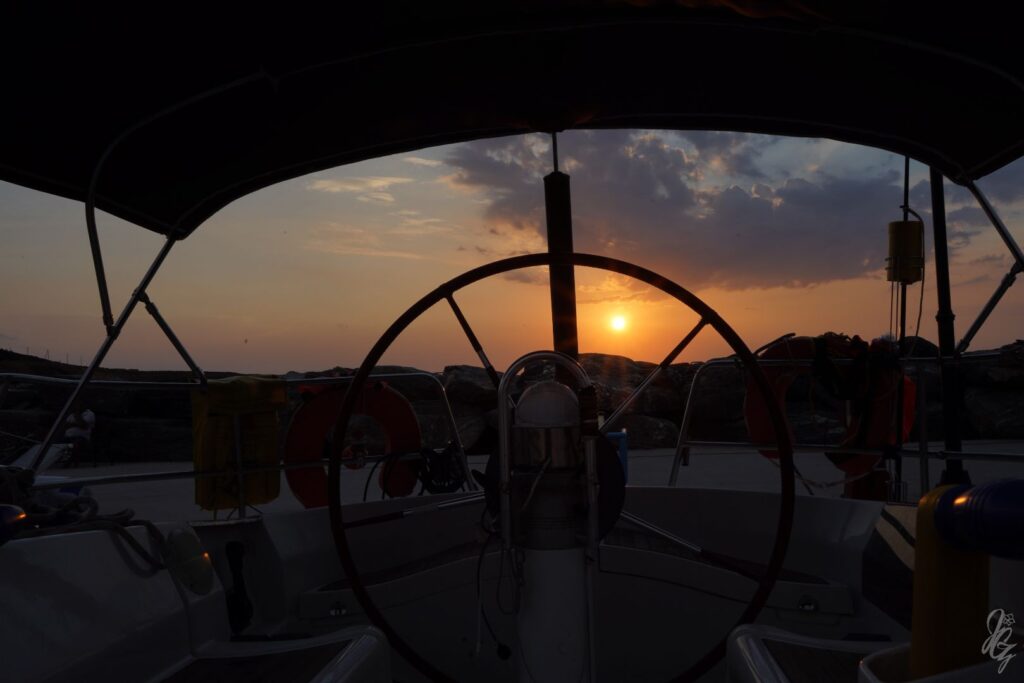 The sailing boat at sunrise