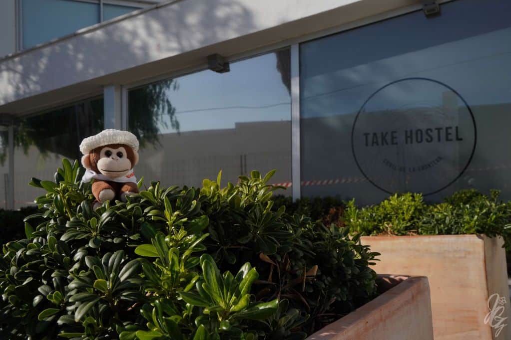 Charlie in front of Take Hostel