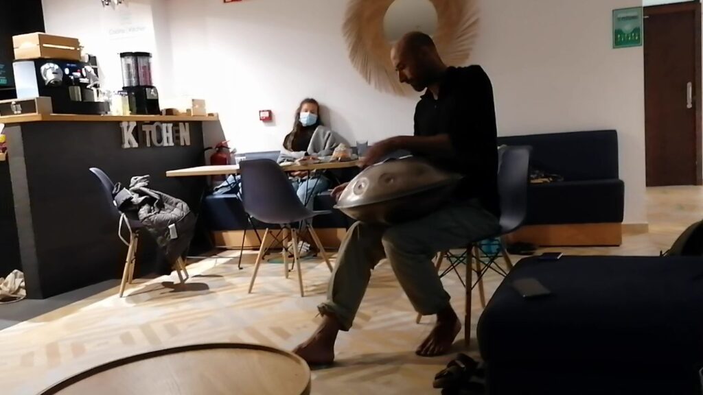 Flavio playing the hand pan at Take Hostel