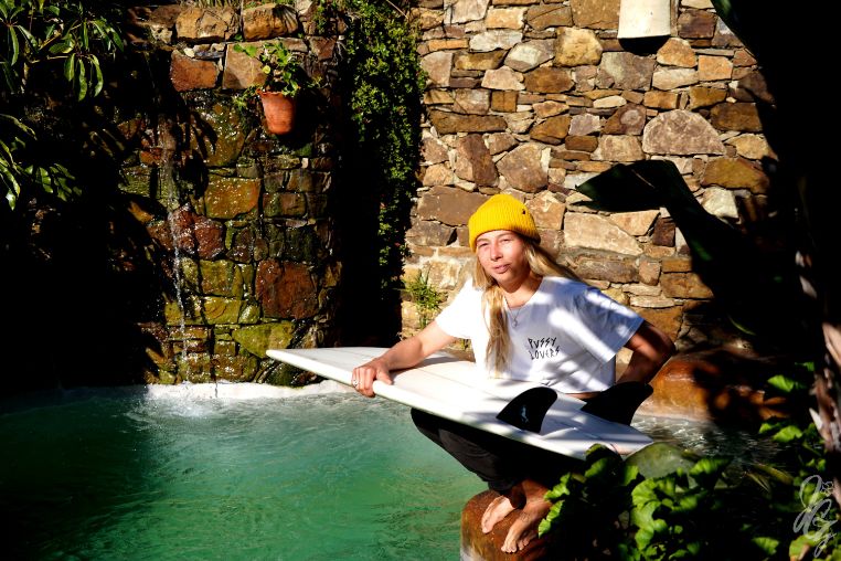 Kiwi with her favourite surfboard at the pond at her home in Conil de la Frontera