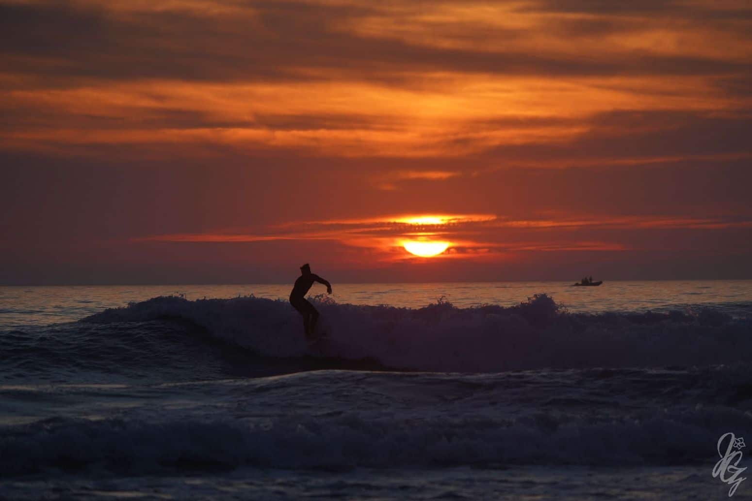 Surfing at Sunset in El Palmar