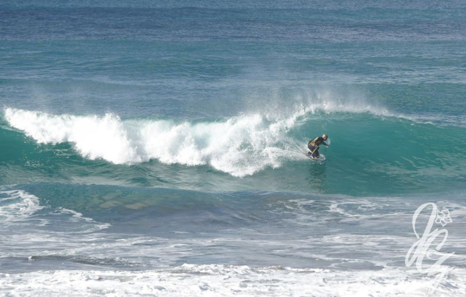 Surfing at Las Canteras beach in Las Palmas in Gran Canaria