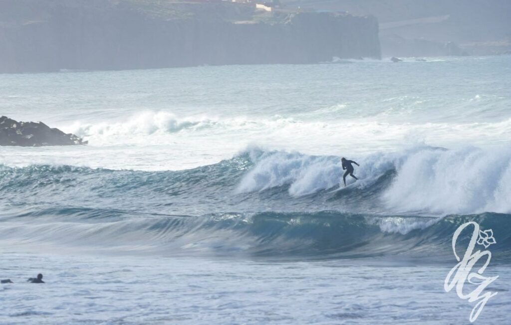 Surfing at Las Canteras beach in Las Palmas in Gran Canaria