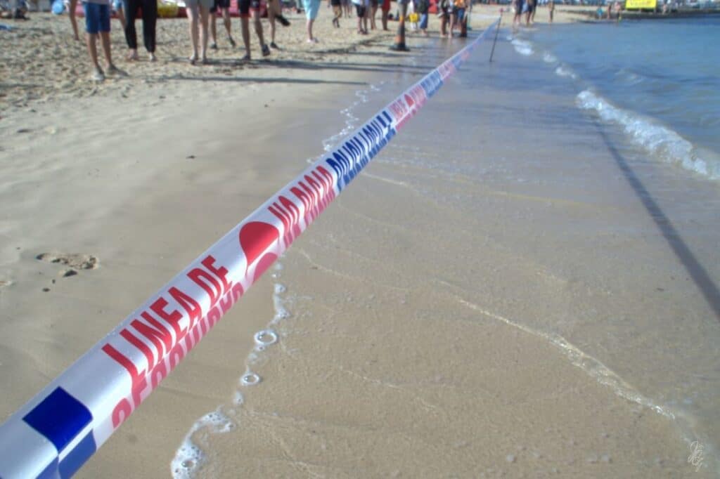 Tape to close the beach and prevent visitors to swim because of sharks