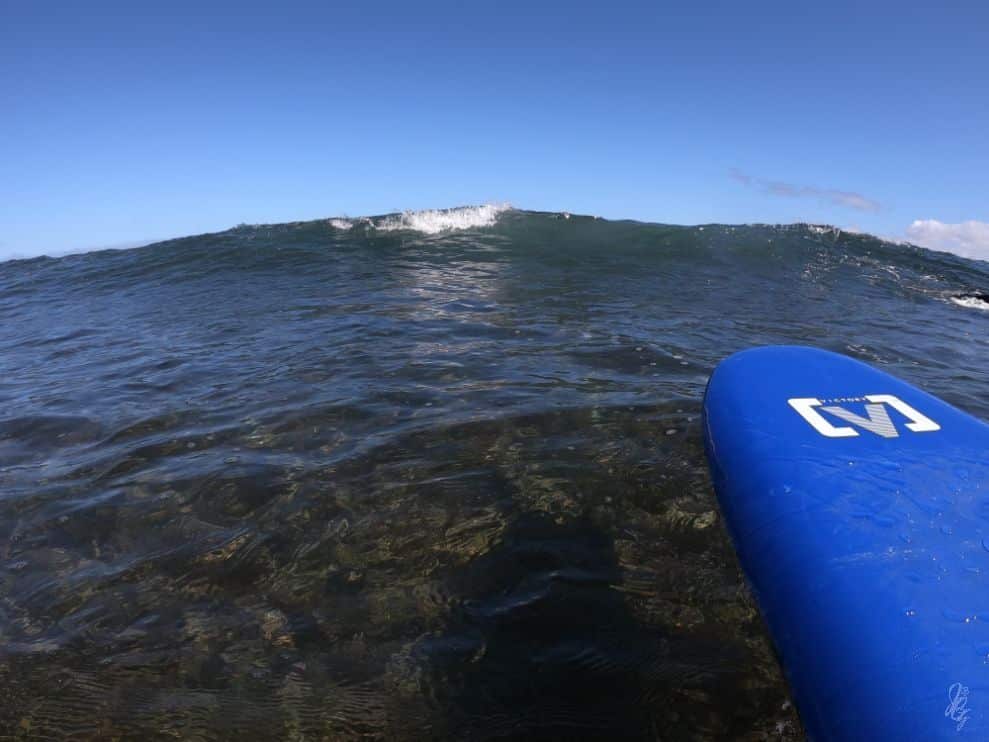 Surfboard on volcanic reef, North Shore Fuerteventura