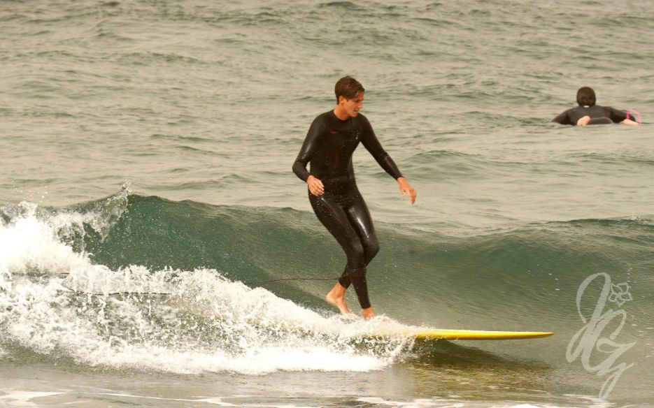 Surfing at Las Canteras beach in Las Palmas in Gran Canaria