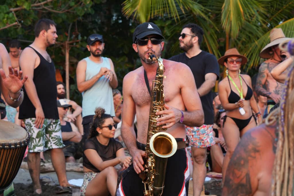 Musician on the beach at Envision festival