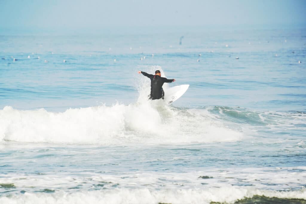 Surfing at Pacific Beach in San Diego