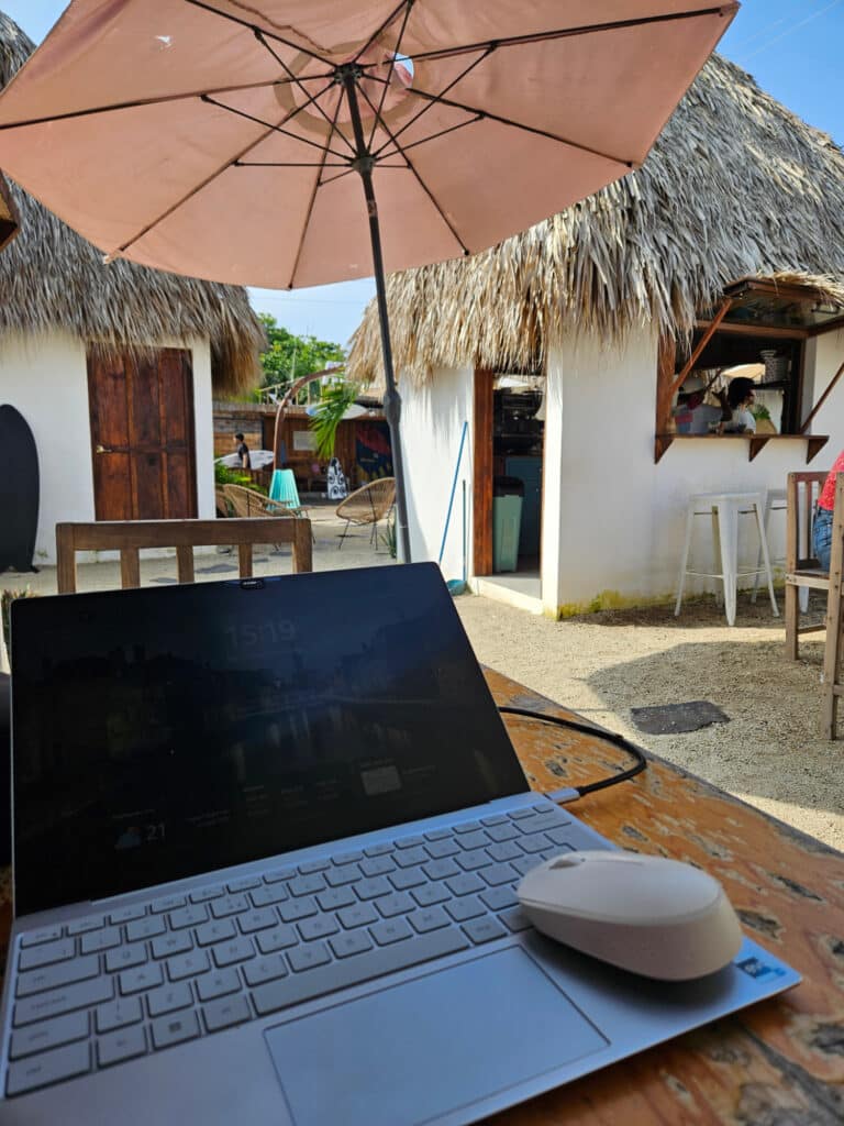 Working on the laptop in El Paredón