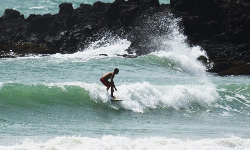 Surfing at Praia de Miami