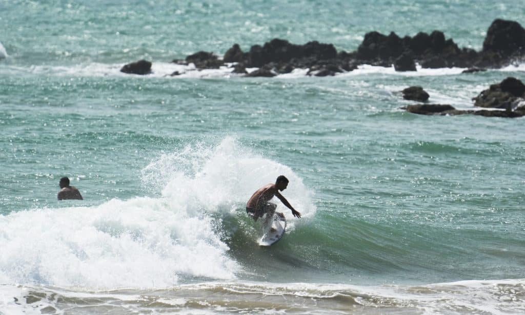 Surfing at Praia de Miami