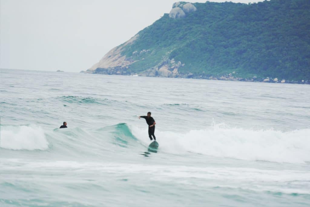 Surfing at Praia Mocambique in Florianopolis