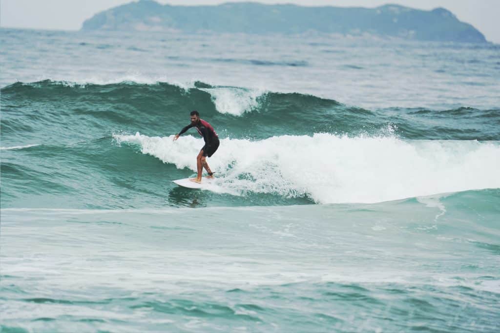 Surfing at Praia Mocambique in Florianopolis