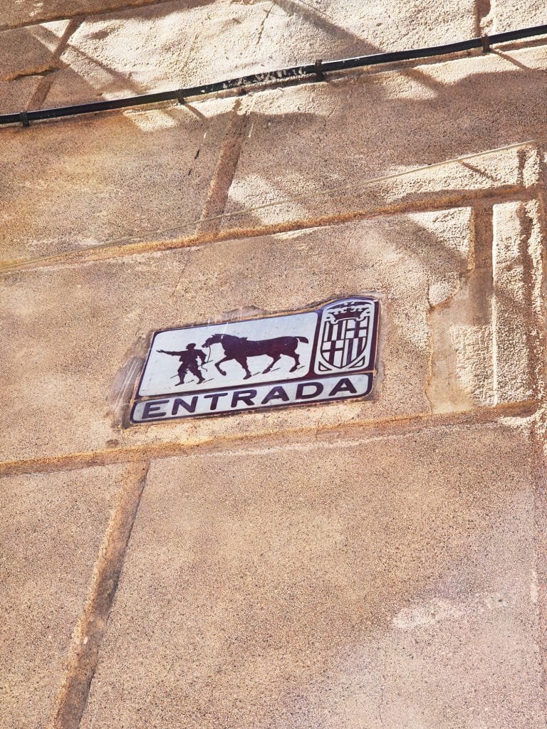 Entrance sign to a road in the old town of Barcelona
